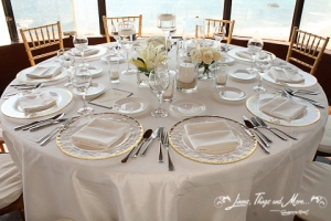 Los Cabos wedding set-up: Gold and off white tables 