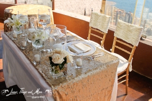 Los Cabos wedding decor: Gold and off white linens 